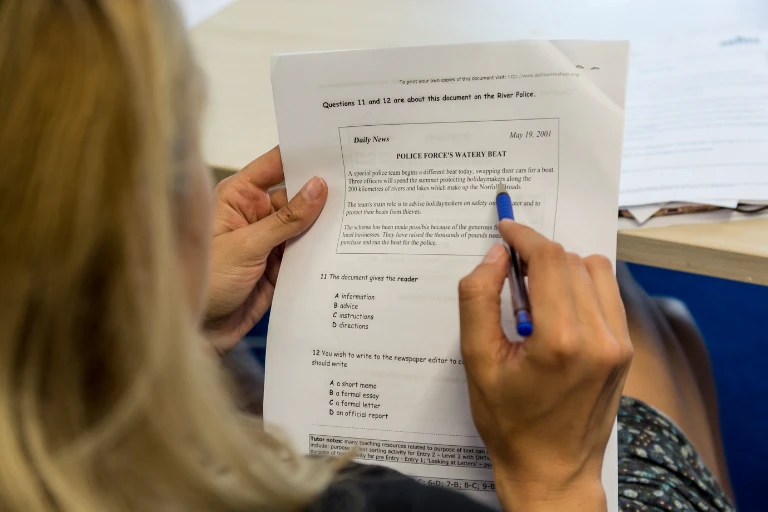 A learner working through an English reading comprehension exercise